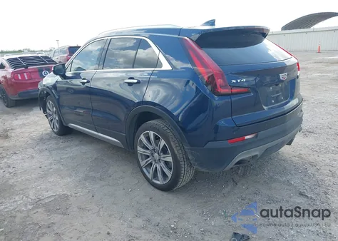 2021 Cadillac Xt4 Fwd Premium Luxury from USA, damaged, VIN 1GYFZCR47MF083284